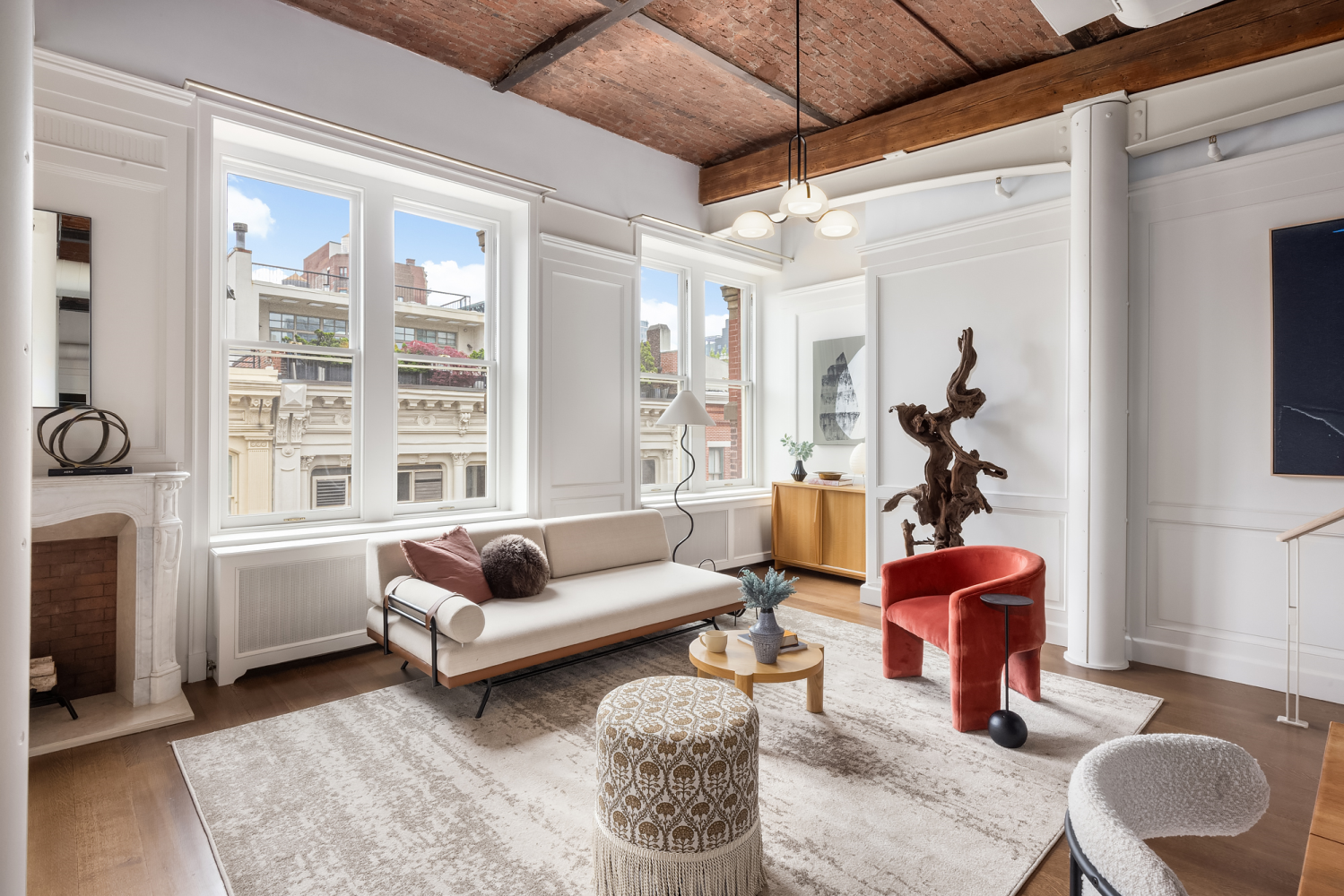 Loft interior with expansive windows and open-plan living